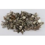 Mixed lot of silver and white metal charm bracelets, unsorted, gross weight approx 548g, As Found