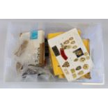 Large plastic crate of very mixed Cap badges, many Military Buttons, Cloth incl Home Guard, etc etc.