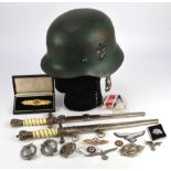 Box of theatrical props, medals, badges, helmet, daggers (Qty)