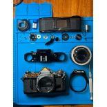 A Canon AE 1 film camera with 50mm / F1.4 SSC / FULLY SERVICED s/n 1165809