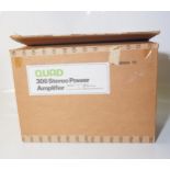 A Quad system 306 amplifier COMPLETE WITH ALL CABLES NEVER BEEN USED