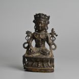 A CHINESE BRONZE FIGURE OF SEATED GUANYIN, MING DYNASTY OR LATER.