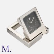NO RESERVE - Gucci, A Travel Alarm Clock in stainless steel. Signed, numbered, marked Swiss Made.