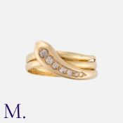 An Old Cut Diamond Snake Ring in 18 carat yellow gold, designed as a coiled snake, the head set with