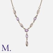 An Amethyst Arts and Crafts Necklace set with oval cut amethysts and spheroid links. Size: 42.5cm