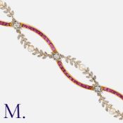 A Fine Art Nouveau Ruby Pearl and Diamond Bracelet in 18 carat yellow gold and platinum,