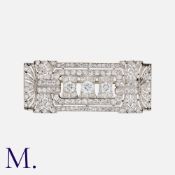 A French Art Deco Diamond Plaque Brooch in platinum, of openwork, geometric design, set with