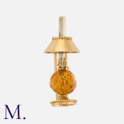 MELLERIO, A French Citrine Lamp Brooch in 18 carat yellow gold, designed as a lamp, set with a