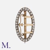 An Old Cut Diamond Buckle Brooch in yellow gold and sliver, designed as a buckle, set with old cut