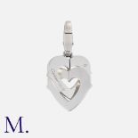 CARTIER, A Diamond Double Heart Charm Pendant in 18 carat white gold, comprising two interlocking