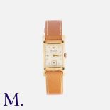BULOVA Wristwatch in 14 carat yellow gold, the white dial signed Bulova, Arabic Numerals, small