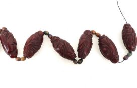 COLLECTION OF CARVED CHINESE NUTS, EARLY 20TH CENTURY