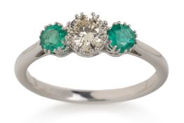 EMERALD AND DIAMOND THREE STONE RING,