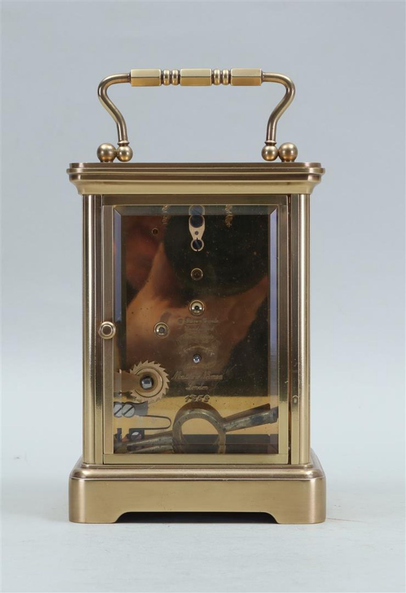 Brass carriage clock with facet-cut windows, enamelled dial with Roman ...