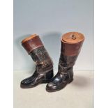 A miniature pair of leather Riding Boots with wooden boot trees and weighted bases 9in high