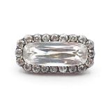 A Victorian Rock Crystal and Diamond Brooch claw-set rectangular scissor-cut rock crystal within a