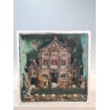 A glazed cased Grotto in the form of a Country House with picket fence and gated front Garden,