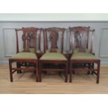 A set of six early Chippendale style elm Dining Chairs with pierced splat backs, drop-in seats on