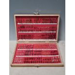 A wooden Fly Box containing a selection of dry and wet Trout Flies, to include 'Walkers Sedge', '