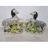 A pair of 19th century Staffordshire pottery Zebras with painted details, 8in