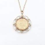 A Victorian shield back half Sovereign 1883 in 9ct gold pendant mount on fine 9ct gold chain, approx