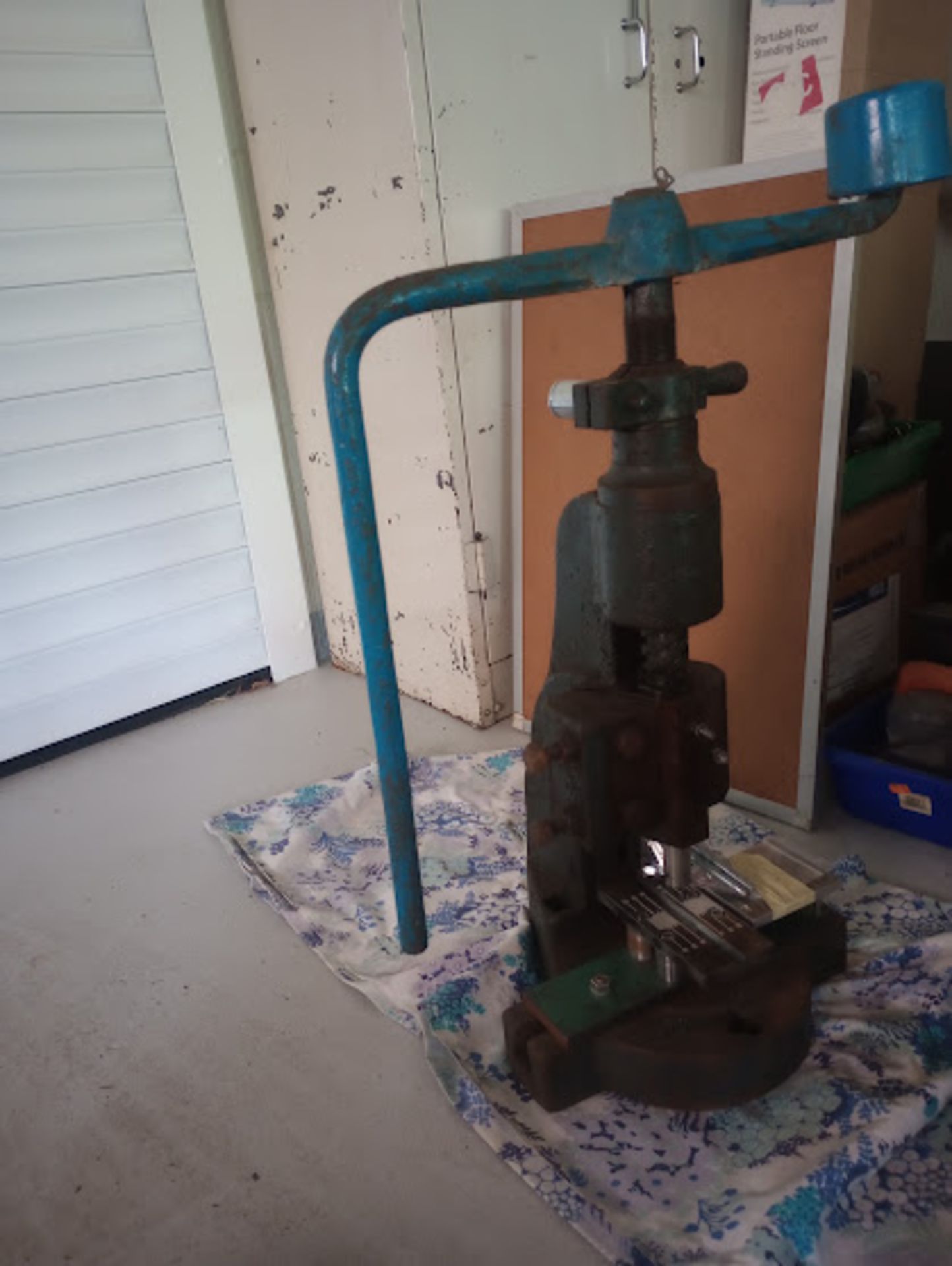 Sweeny Fly Press adaptation plates currently on the base of the fly press - these can be removed to