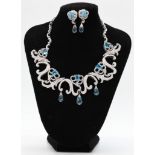 18K gold diamond and blue topaz necklace and earring suite