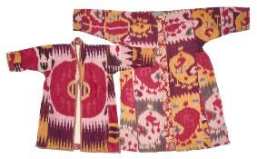 A GIRL'S AND A CHILD'S IKAT CHAPAN, BOKHARA, UZBEKISTAN, EARLY 20TH CENTURY