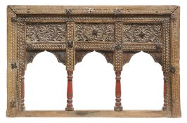 A CARVED AND PAINTED WOOD SHELF FRONT, SWAT VALLEY, PAKISTAN, 19TH CENTURY