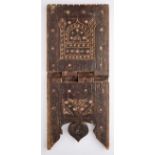 A CARVED WOOD FOLDING QUR'AN STAND, PROBABLY ZANZIBAR, LATE 19TH/EARLY 20TH CENTURY