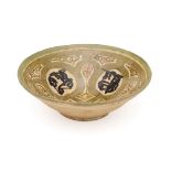 A NISHAPUR SLIP PAINTED BOWL, PERSIA, CIRCA 10TH CENTURY