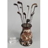 Japanese ceramic hatpin holder together with a collection of novelty hatpins, mainly in the form