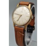 Vintage Tudor (Rolex) 9ct gold gentleman's wristwatch with Baton numerals and centre seconds, on