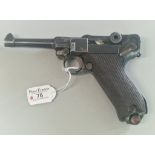 WW1 DWM 9mm Luger semi-automatic pistol, dated 1917, serial number 9698/4717, with chequered grip