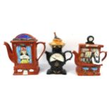Three Swineside novelty teapots. Collection of humorous novelty teapots by Swineside Ceramics.