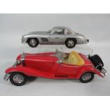 Pair of large-scale die-cast classic automobile models, both complete with original boxes. The top