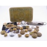 A mixed Princess Mary christmas tin and agroup of military buttons, badges and insignia, cloth badge