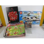 Four boxed Lego sets: Botanical Collection Bouquet of Roses 10328, City Police Helicopter 7899 (moto