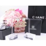 A pair of Chanel style drop earrings, each with faux pearl surmount and decorative interlocking