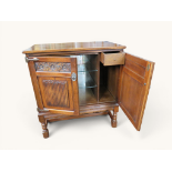 Old Charm oak illuminated drinks cabinet with carved linenfold doors and glass shelves, 39 inches hi