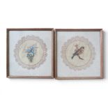 A pair of decorative framed embroidered studies comprising a floral spray and a goldfinch, each