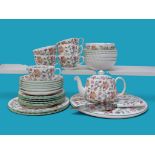 A Minton Haddon Hall pattern part tea service, comprising approximately 30 pieces including