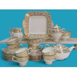 A Wedgwood Gold Florentine part tea service and serving wares, including teapot, covered sugar bowl,