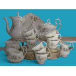 A Royal Albert Haworth pattern part tea and coffee service, including coffee pot, teapot, covered
