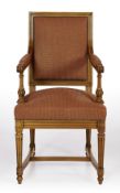 A pair of "Roussin" chairs is a refined contemporary interpretation of the Louis XVI style (circa