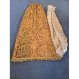 A Pair Lined Pencil Pleat Top Of Silk Drapes Tie Back Decorated With A Large-Scale, Traditional