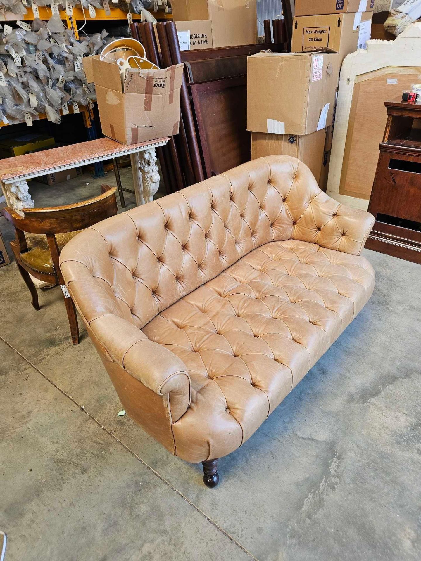 A Chesterfield Style Two Seater Leather Sofa Tufted Back Seat Pad And Interior Of Arms In A Tan - Image 2 of 4