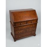 George III Mahogany Bureau Solid mahogany construction defines this late 18th-century style