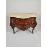 Louis XV Style Rosewood Bombé Commode This Louis XV style rosewood commode features a classic