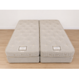 A Vi-Spring 'Hotel Supreme' zip-and-link pocket-sprung bed system. Comprising a pair of matching